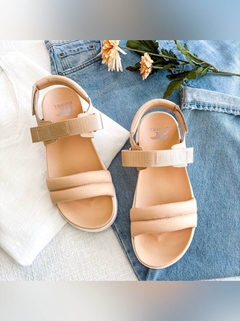 Sorel Viibe puffy sandals.